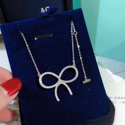 [⭐Sparkve Jewels]CLAW SET RHODIUM PLATED BOW NECKLACE