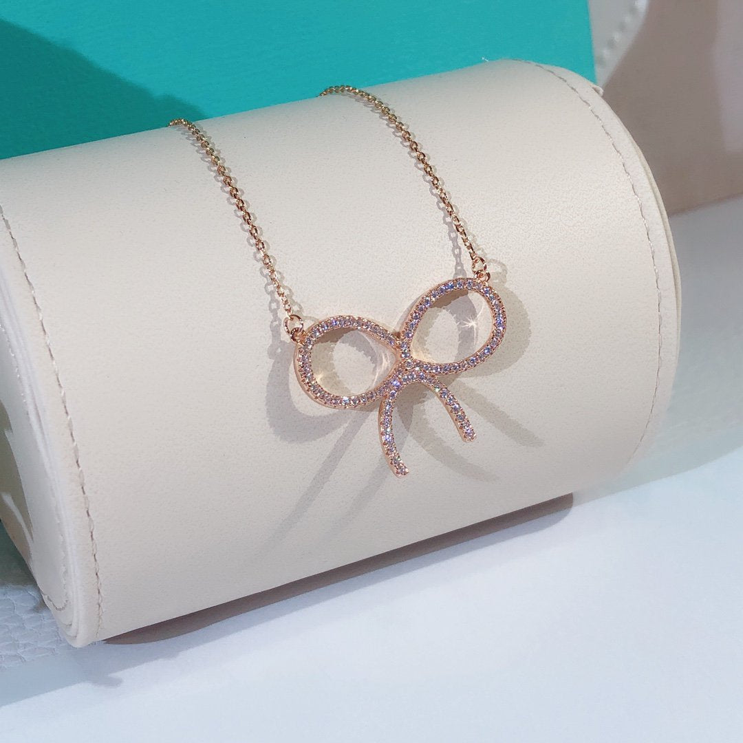 [⭐Sparkve Jewels]CLAW SET RHODIUM PLATED BOW NECKLACE