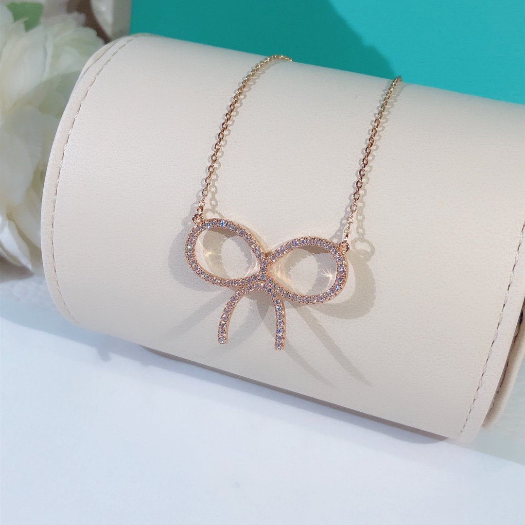 [⭐Sparkve Jewels]CLAW SET RHODIUM PLATED BOW NECKLACE