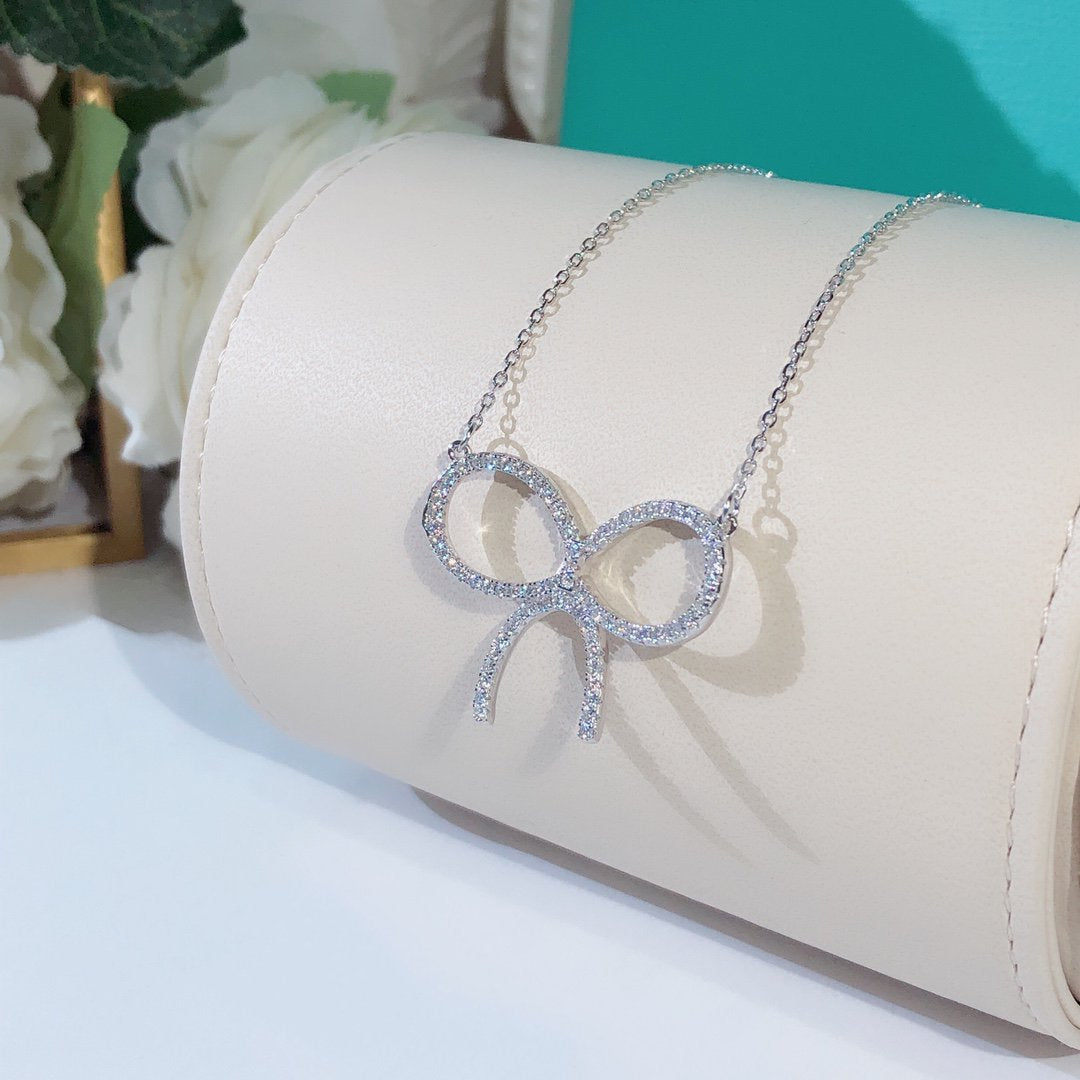 [⭐Sparkve Jewels]CLAW SET RHODIUM PLATED BOW NECKLACE