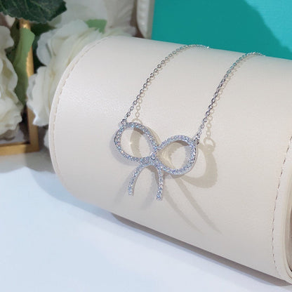 [⭐Sparkve Jewels]CLAW SET RHODIUM PLATED BOW NECKLACE